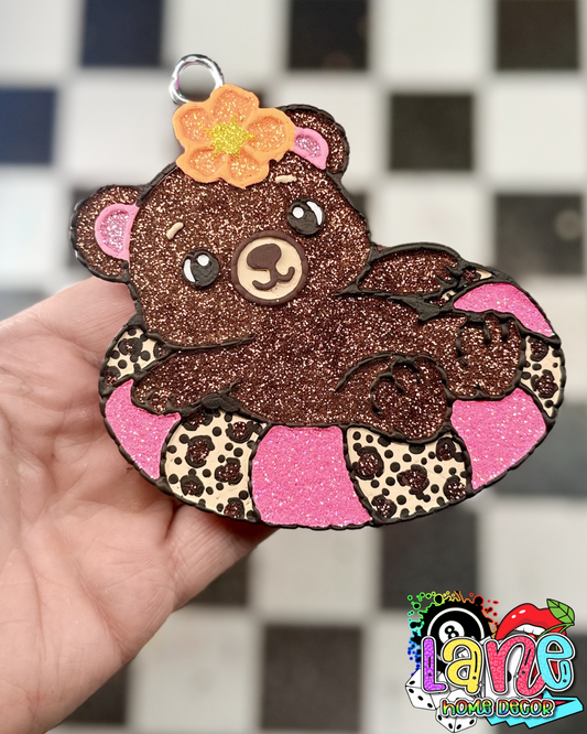 Bear in a floatie RTS •birds of paradise